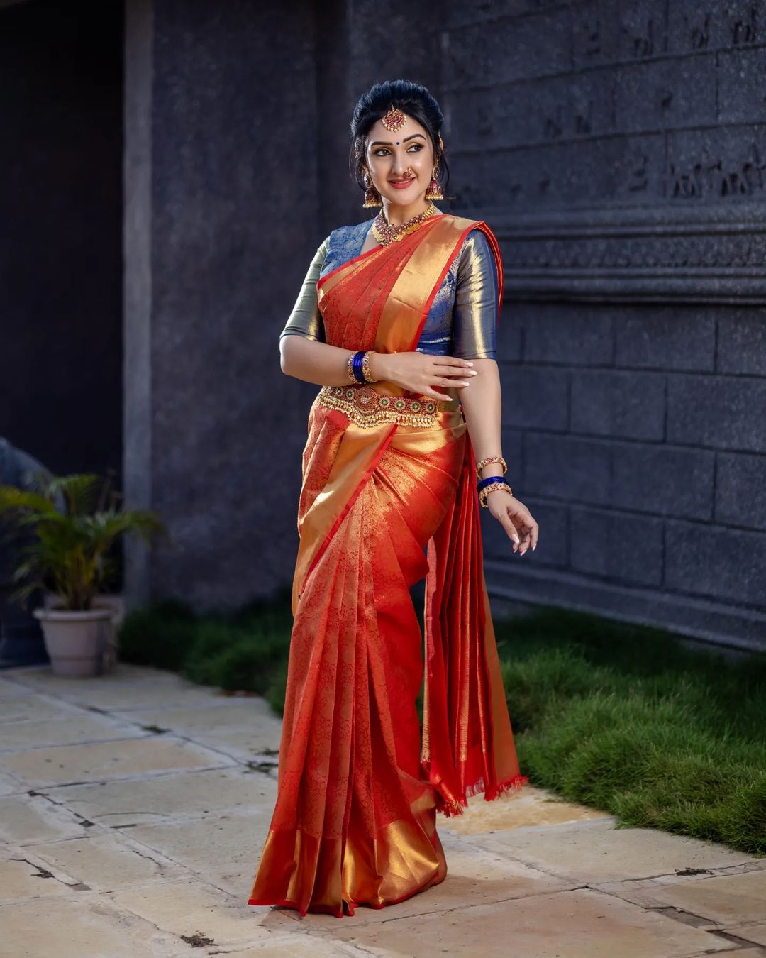 Telugu TV Actress Sridevi Vijaykumar Images in Orange Saree Blue Blouse 2